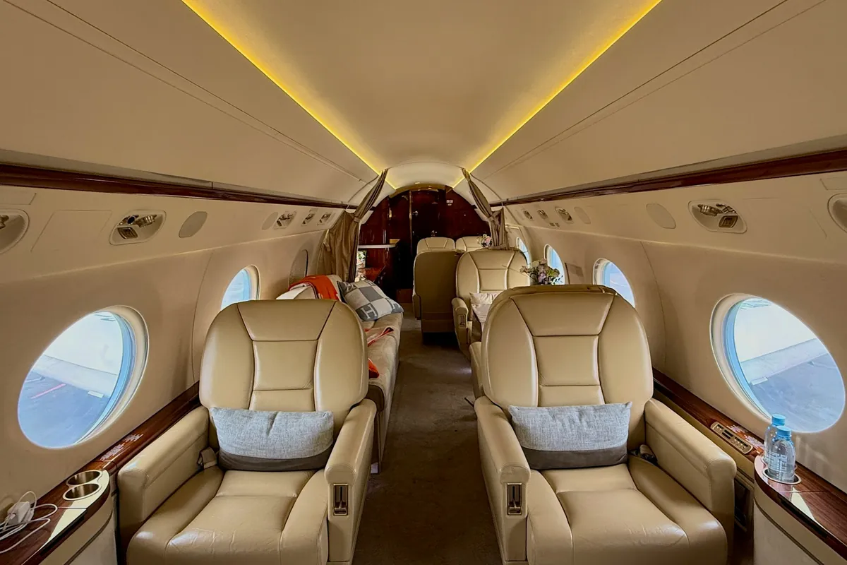 Private jet cabin with club seating